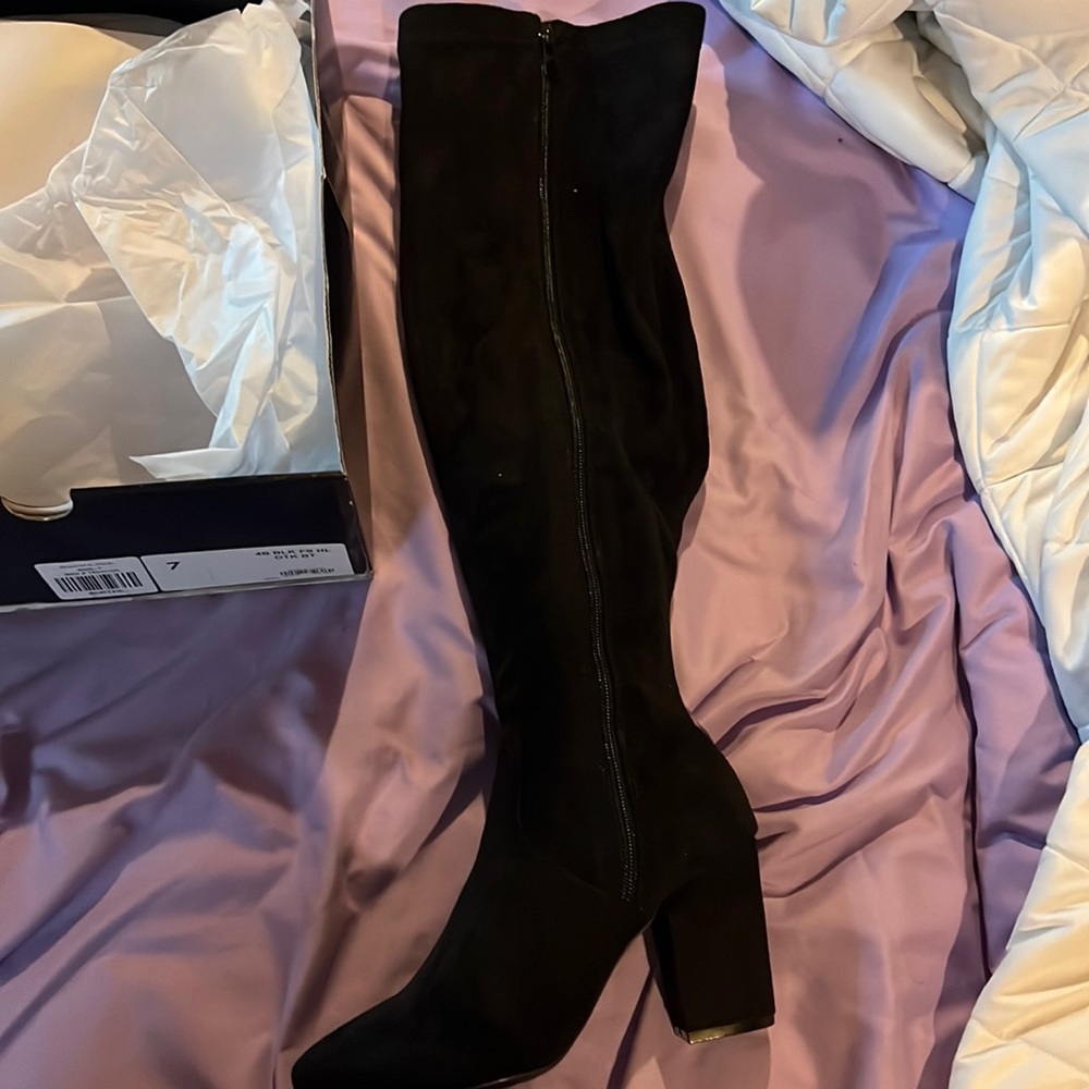 Wide calf over the knee boot.